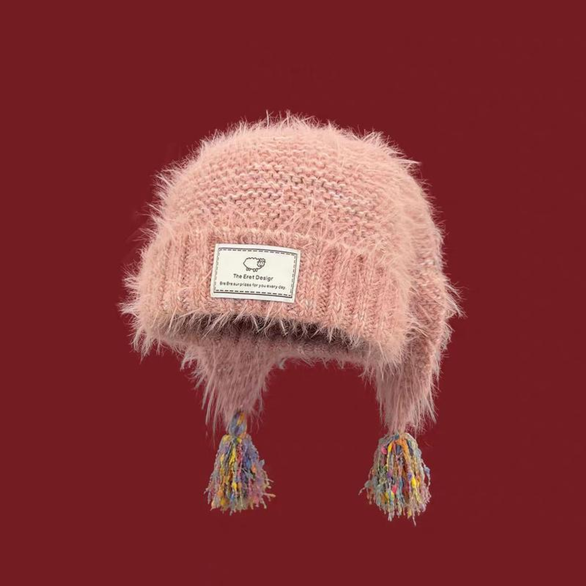 BUNNY-EAR TASSEL KNIT BEANIE. Pink