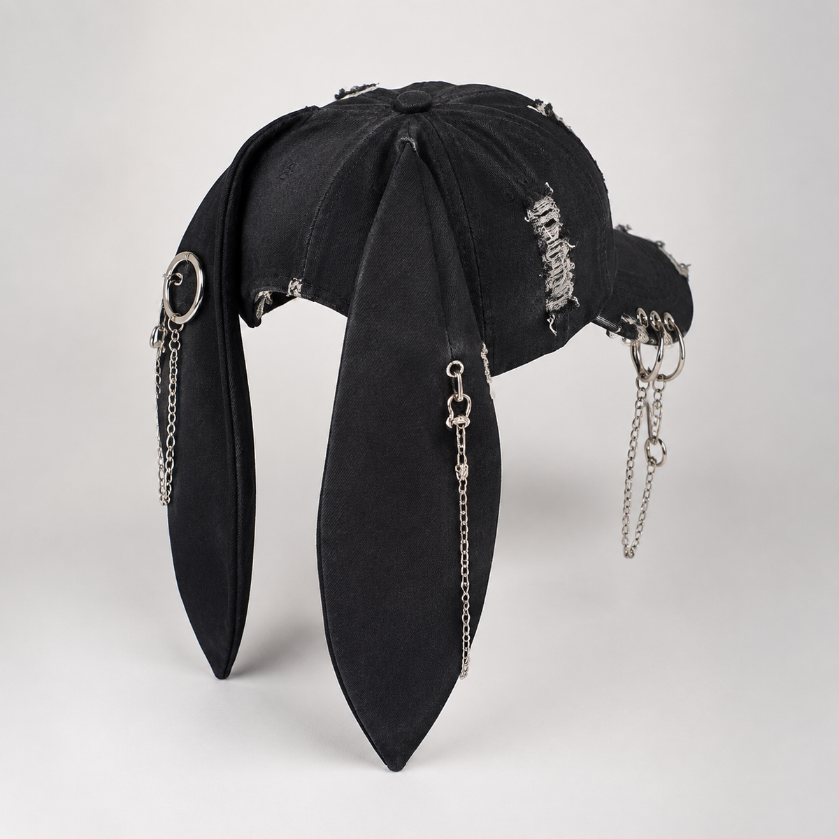Rear view of black bunny-ear chain cap
