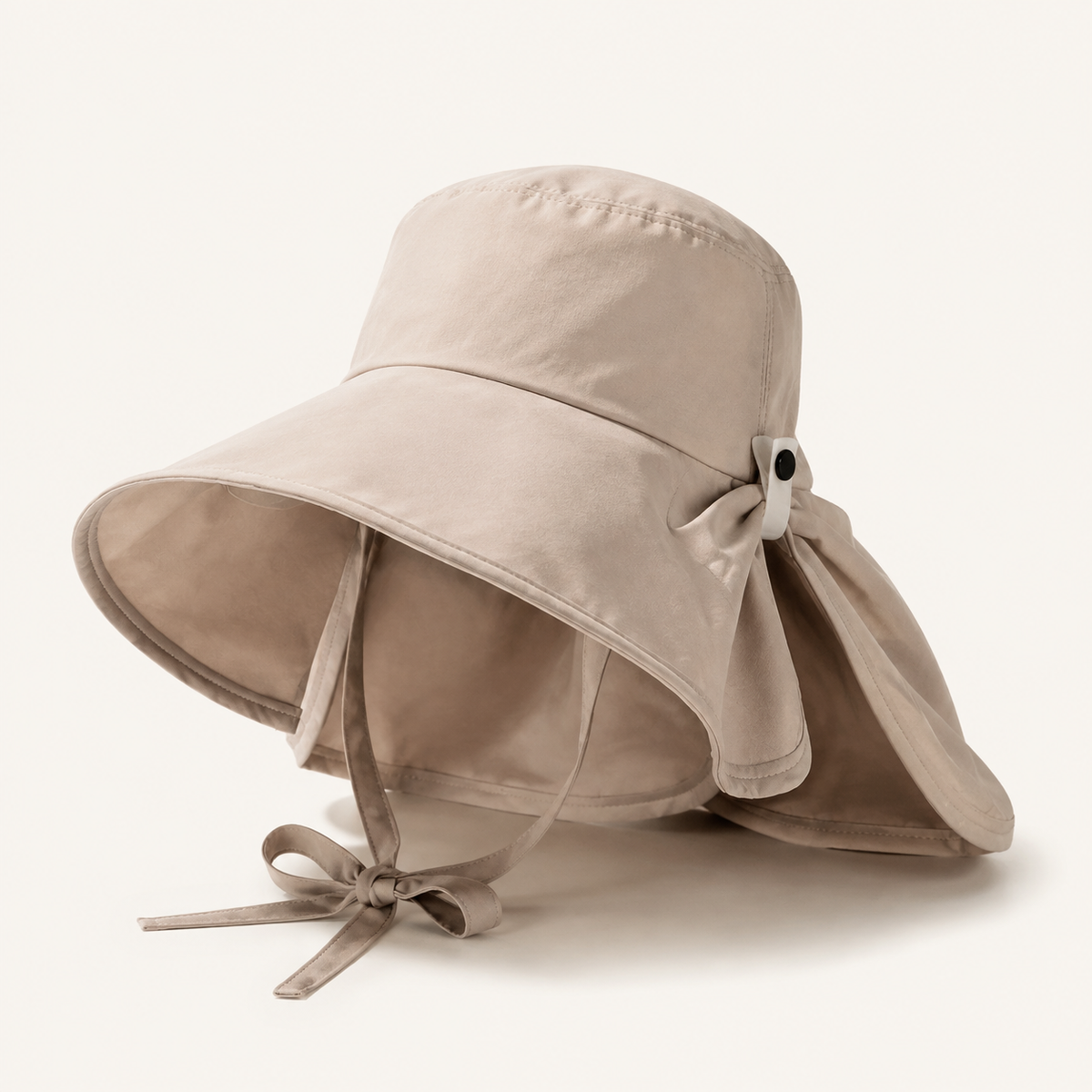 Front view of beige double-layer bow-back hat