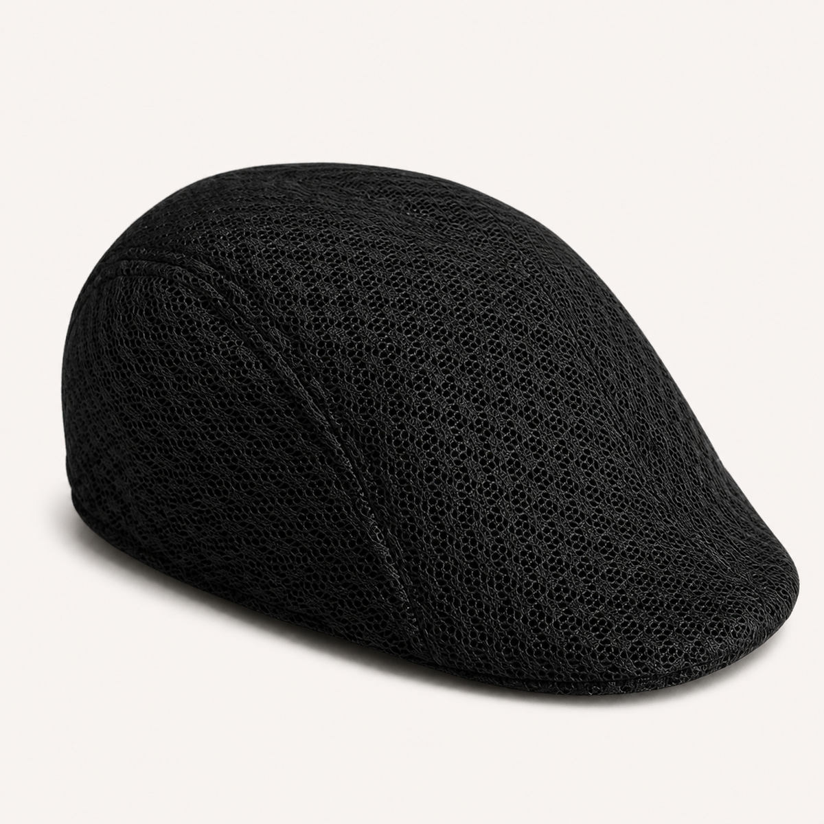 Black full mesh flat cap from a side angle
