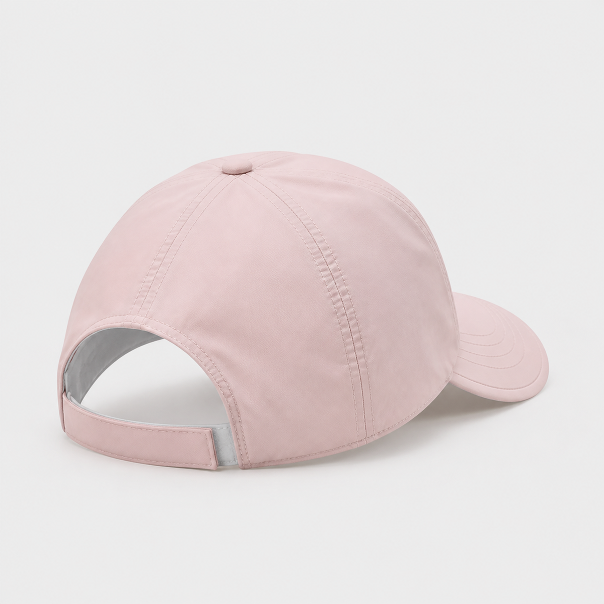 Pink lightweight ponytail cap showing the open back