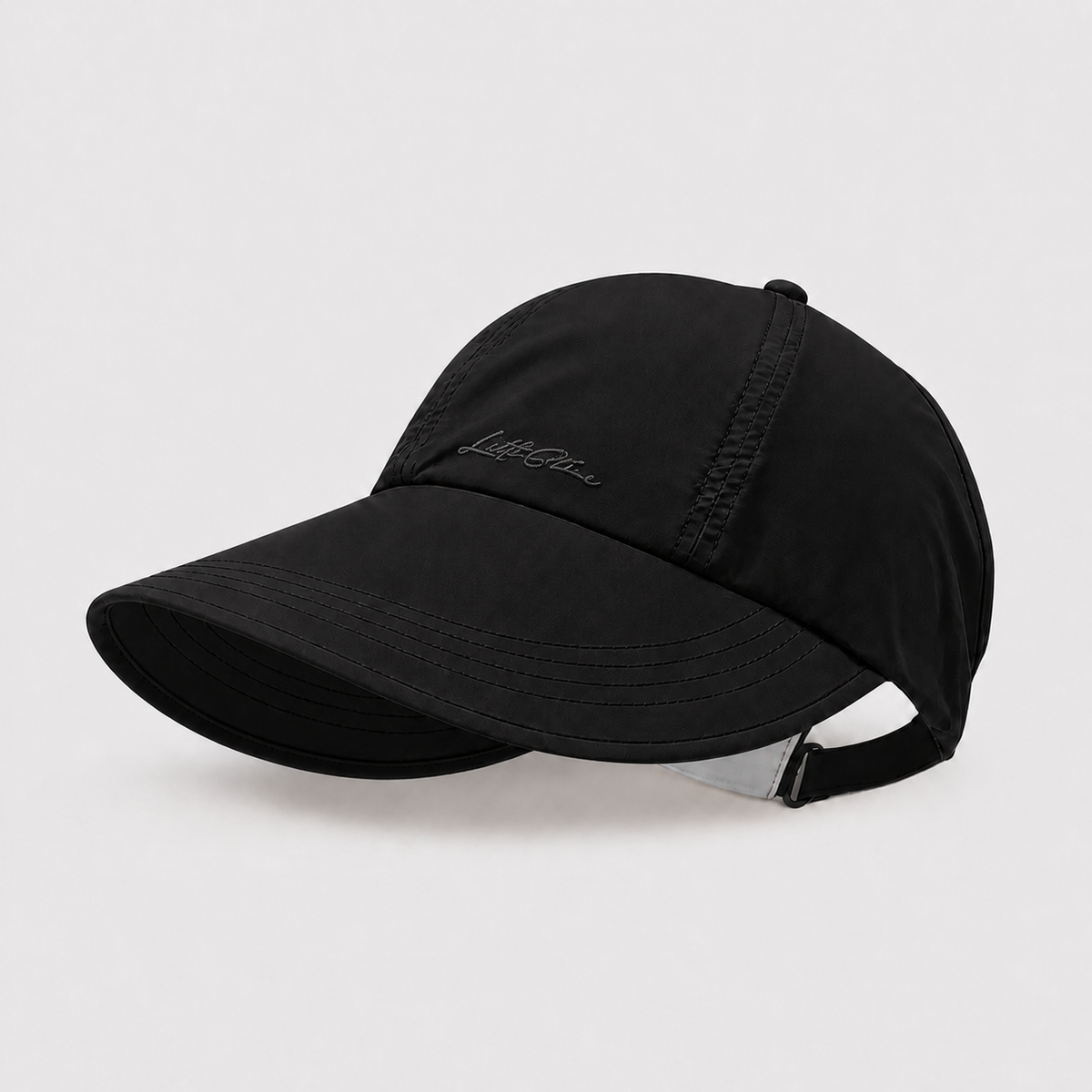 Black lightweight ponytail cap with an extended curved brim