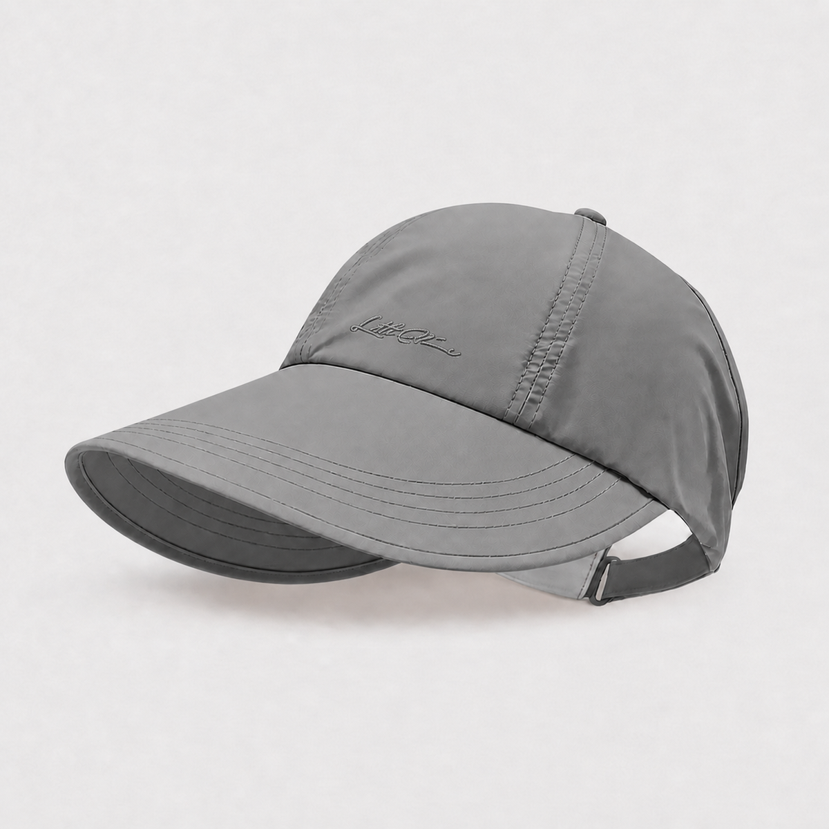 Gray lightweight ponytail cap with an extended curved brim