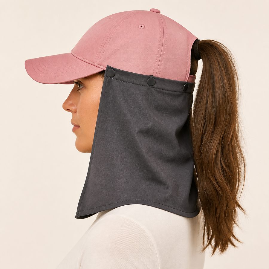 Side view of the ponytail cap and neck drape worn